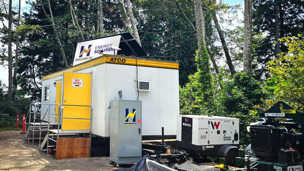 Hanna Energy PowerRack 48/14 providing temporary power at a remote construction site with a site office and generator
